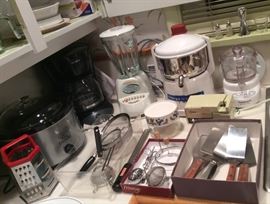 Small appliances incl. Crock Pot, coffee maker, Hamilton Beach blender, Omega Juicer Model 1000, Cuisinart mini food processor, assorted utensils