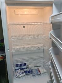 Like new GE 17.3 cu. ft. frost-free upright freezer (32" W, 26.5" D, 64.5" H) - exterior is white