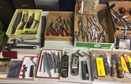 Hand tools: pliers, wrenches, planes, punches, files, tons of screwdrivers (way more than shown here)