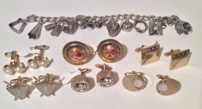Sterling charm bracelet with Western/cowboy theme, vintage cufflinks. Center pair (gold color with copper center) are by Winifred Mason Chenet, a female African American jewelry artist who worked in Greenwich Village & trained with Art Smith, noted modernist jewelry maker.