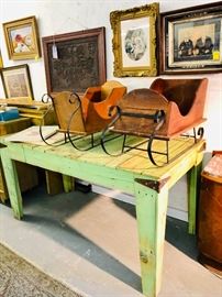 2 Vintage Sleighs , primitive style farm table, antique pictures and engravings