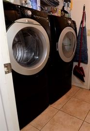 Black washer and dryer for sale.