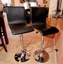 Modern black and metal bar stools for sale.