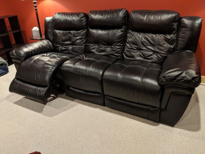 Leather power reclining sofa