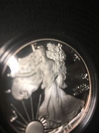 1986 1 oz silver coin...………………….