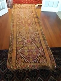Kars Kilim from Turkey. 14'x4' flatweave (Kilim) runner. Soft browns, pinks and yellows with traditional designs from Eastern Turkey. Wool on wool.