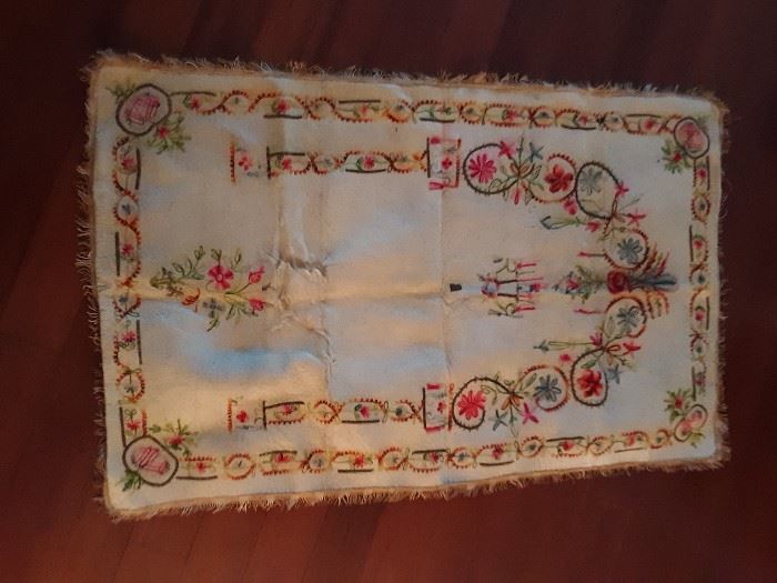 Turk felt prayer rug.  Colorful embroidery on cream, felt background.  Well worn where the knees were placed for worship.  Very special piece for the right collector!