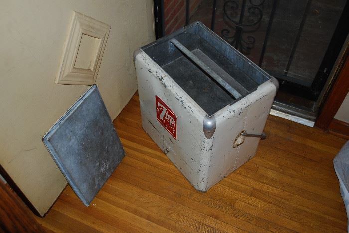 CIRCA 1950s 7UP COOLER - Manufactured by: Progress Refrigerator Co., Louisville, KY - Includes: Side Bottle Opener, Upper Galvanized Tray and Original Drain Cap - 18"W x 13" D x 21 3/8" H