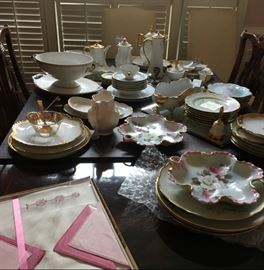 Table full of vintage white china