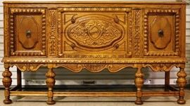 Heavily carved sideboard