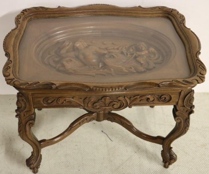 Heavily carved tray top table