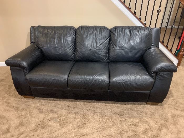 Chateau D' Ax $800                                                                           Three piece black leather sofa, loveseat and chair