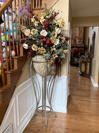 Tall vase stand with artificial flowers $429