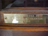BRASS PLAQUE ON CLOCK