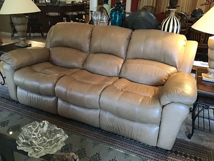 Leather Sofa with reclining ends. Light Tan color