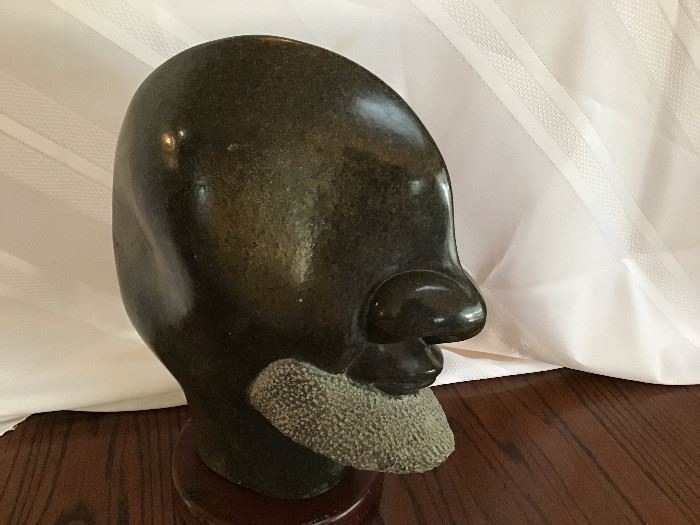 "The Blind Head" by Edward Kumbuwo carved from Kwekwe Fruit Serpentine Stone from Zimbabwe