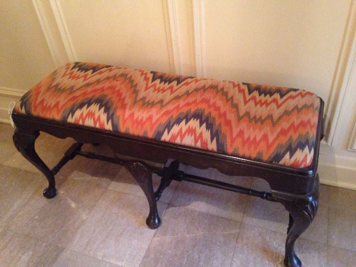 Antique upholstered 6-legged bench