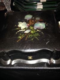 Vintage black paper mache box with floral design on top