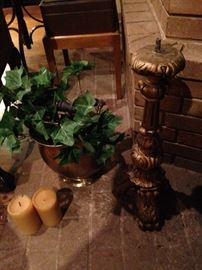 One of two large candle holders; brass planter