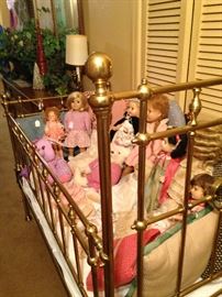 The brass baby bed is great for display.