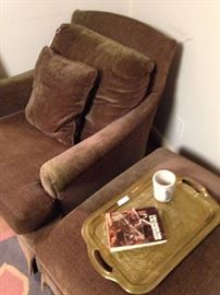 Brown club chair and ottoman; solid brass tray