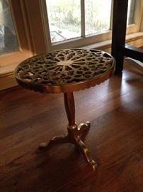 Antique three footed solid brass plant stand