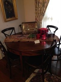 Stunning round antique table; 6 chairs are sold separately from the table