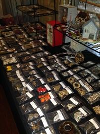 Large selections of pins, earrings, and bracelets