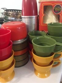 Vintage thermoses and "Cozy Cup Holders" and cups
