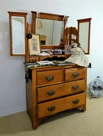 Antique mirrored dresser. Extremely Old composition doll.