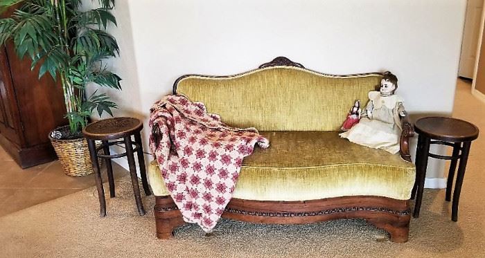 Another antique settee along with a composition antique doll and vintage crocheted coverlet. 2 antique stools great for side tables.