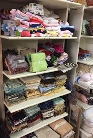 Assorted Swatches of Quilting Fabric in Bundles