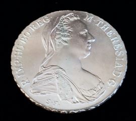 1780 Restrike Austrian Maria Theresa Silver Taler. A modern restrike of this silver coin in its original plastic sleeve from the Osterreichisches Credit Institut of Austria. Excellent bright condition.