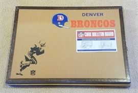 Unopened Denver Broncos bulletin board.