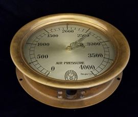 Antique Schaeffer & Budenberg 4000 psi brass pressure gauge repurposed as a battery operated wall clock. Works well.
