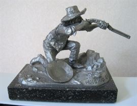 1971 pewter sculpture by Philip Kraczowski (Massachusetts 1916-1996), entitled "Holding Ground", issued by Worcester Pewter, 3 1/2" tall, 5" long, and 3" deep.