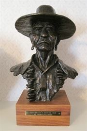 1975 bronze sculpture, #10/18, entitled "Southwest's Native Son" by listed artist Truman Bolinger (Arizona/Wyoming, 1944-current), 11" x 8 1/2" x 7" on a 2 1/2" tall walnut base.