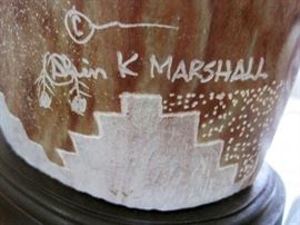 Alabaster stone sculpture of a Navajo with raised arm decorated with pictugraphs, by listed artist Alvin K. Marshall (New Mexico, 1959-current), 14" tall, 13" wde, and 5" deep