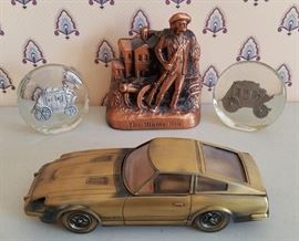 Bank was from the 1st Interstate Bank, Casper, WY. Also includes a desk caddy in the shape of a Fairlady 2800Z car, and two Wells Fargo paperweights.