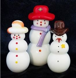 Designed by Thomas Kelly for the Vitrix Hot Glass Studio of Corning, New York. Red hat snowman is 5" tall. The others are 4" tall.