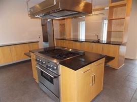 island thermodore stove grill stainless steel hood granite countertops