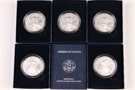 Five 2011 U.S. Mint Silver Uncirculated American Eagle Dollars