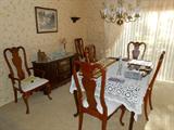 Dining room table with 6 chairs, 2 leaves and table pads
