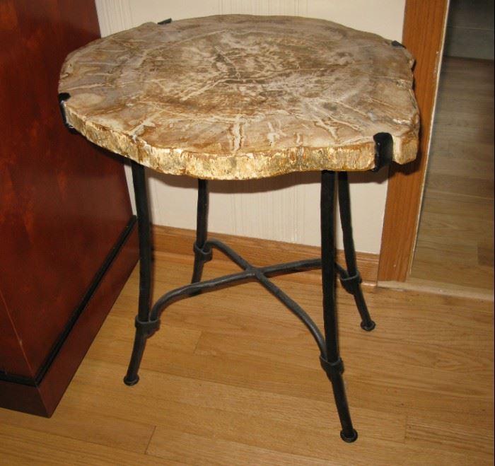 Petrified wood top table with iron base                              
             BUY IT NOW $ 365.00