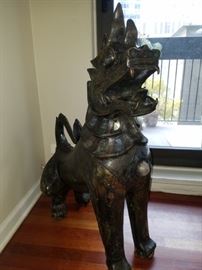 Antique Thai bronze  Foo Dog encrusted with amethyst, rose quartz and mica. Beautifully aged with patina. 3 feet by 3 feet.                                                                                                                Asking Price: $2500