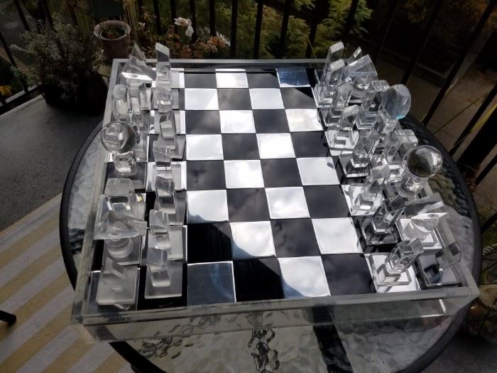 1970's Lucite Chess Piece Set  Great Condition repairs have been made.          Comes with Lucite case.                                  Asking Price: $1,500                                                            
