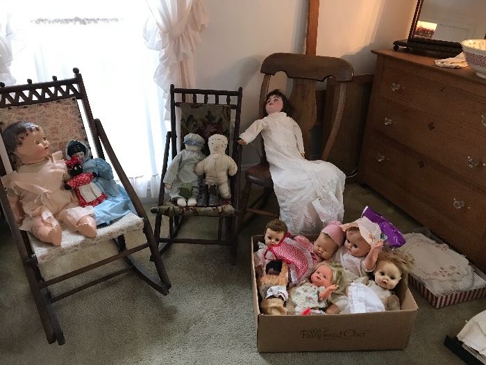 Dolls, antique rocking chairs - one of the dolls is a Kestner