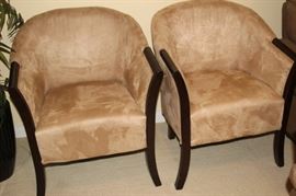 Tow matching faux suede club chairs.