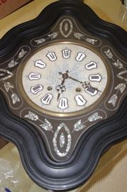 Abilone and mother of pearl inlaid clock.