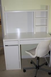 White computer desk and chair.